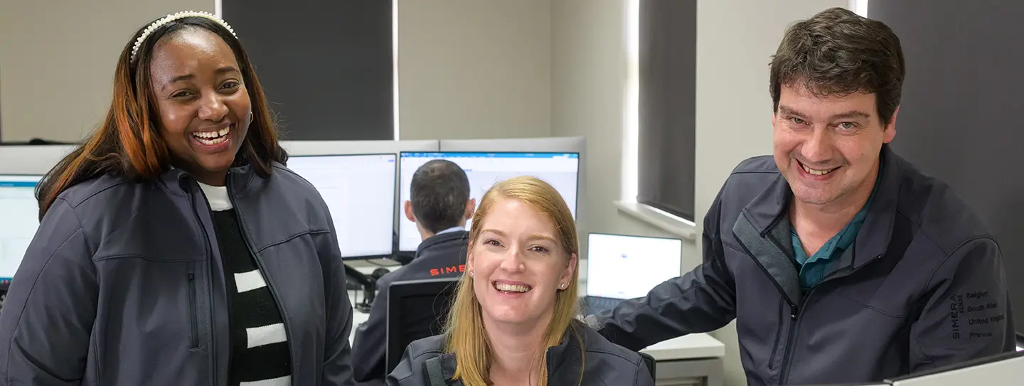Employees smiling