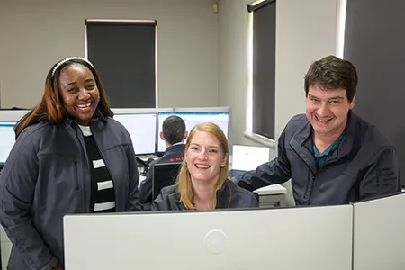 Simera Sense colleagues working together smiling