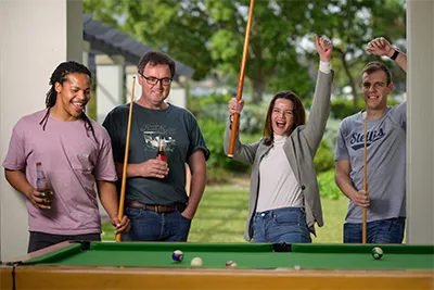 Simera Sense employees playing pool