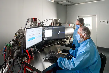 Simera Sense employees working together in cleanroom
